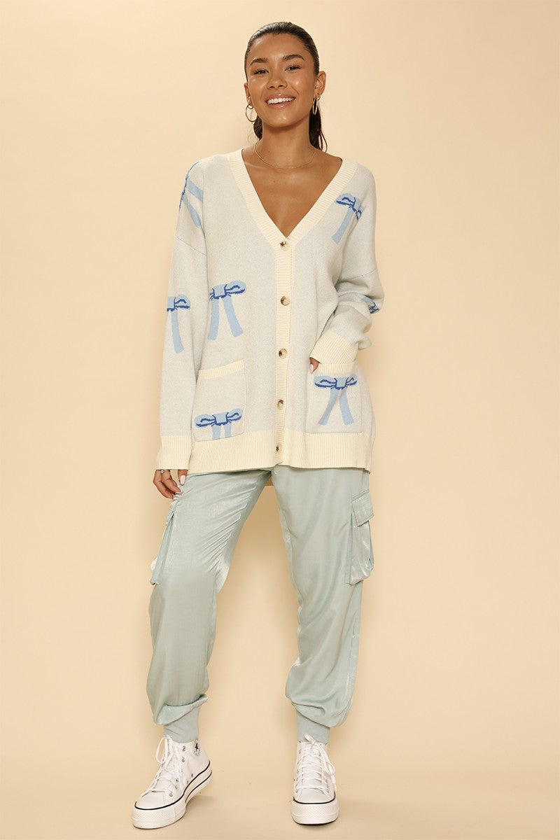 ADRIANNE BOW DESIGN CARDIGAN | CREAM/BLUE