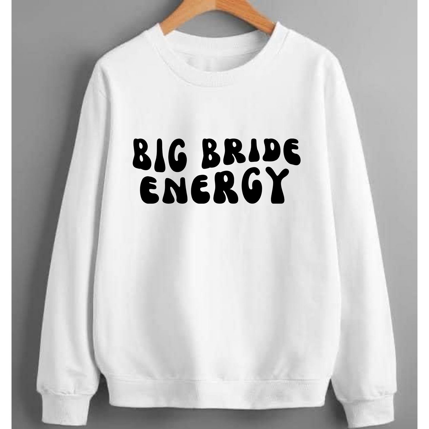 Big Bride Energy, who doesn't love it! Perfect for the Bride to be leading up to your big day! This sweatshirt is soft and comfortable, perfect for casual wear. Made from 50/50 cotton, poly blend, this crewneck sweatshirt is sure to keep you warm and cozy all year long. You can wear it with anything you want to make a fashion statement.  Pick up one of these awesome crewneck sweatshirts today and show off your inner big bride energy!