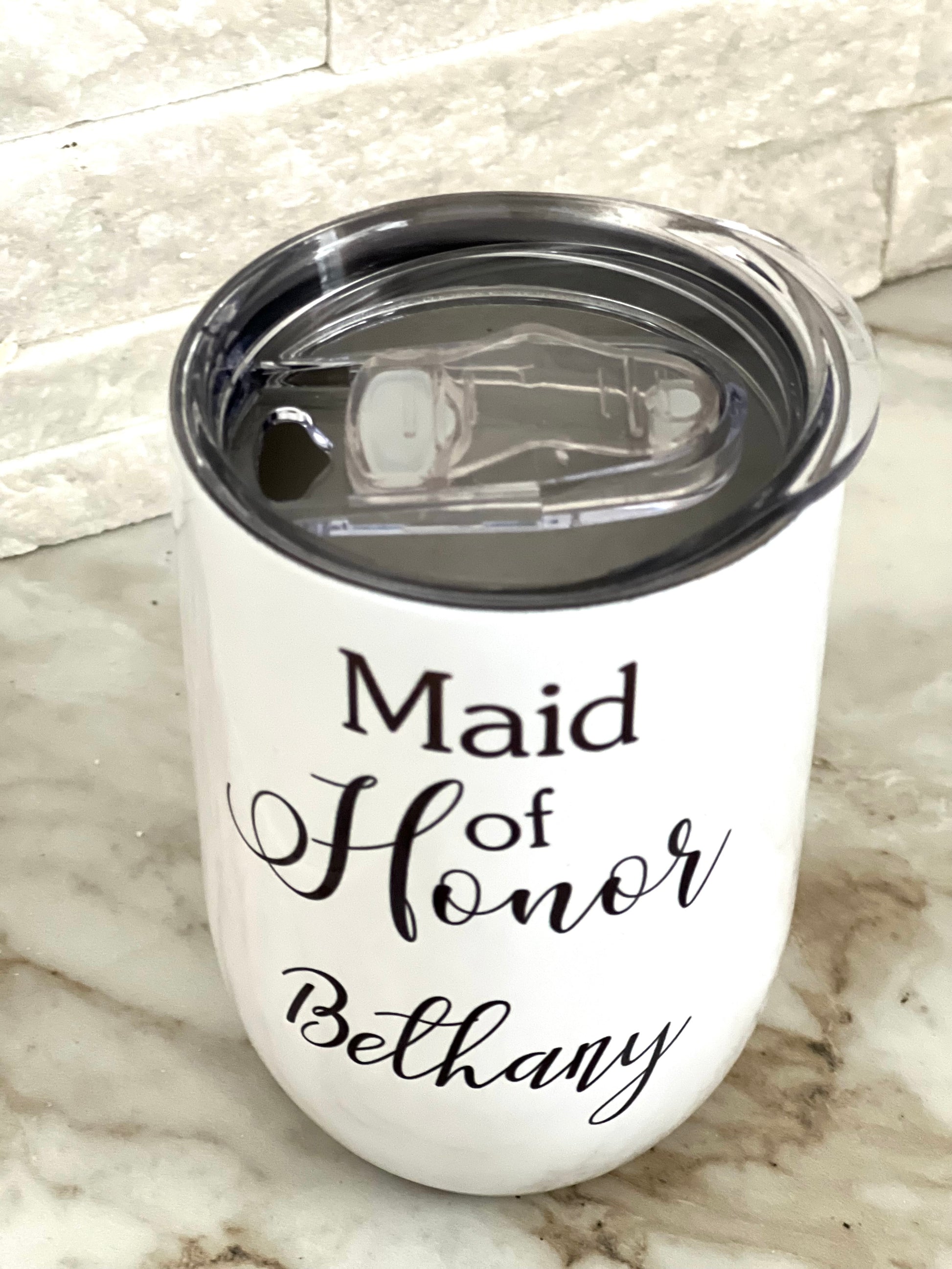 We know how important and special it is to gift the maid of honour a unique gift that she can keep forever. That's why, we've got you covered with our personalization-friendly wine tumbler! A white  wine tumbler in its form and function, this can be personalized with your maid of honours' name. Great for serving wine out of as well as storing your favourite drink, this tumbler comes highly recommended by us.