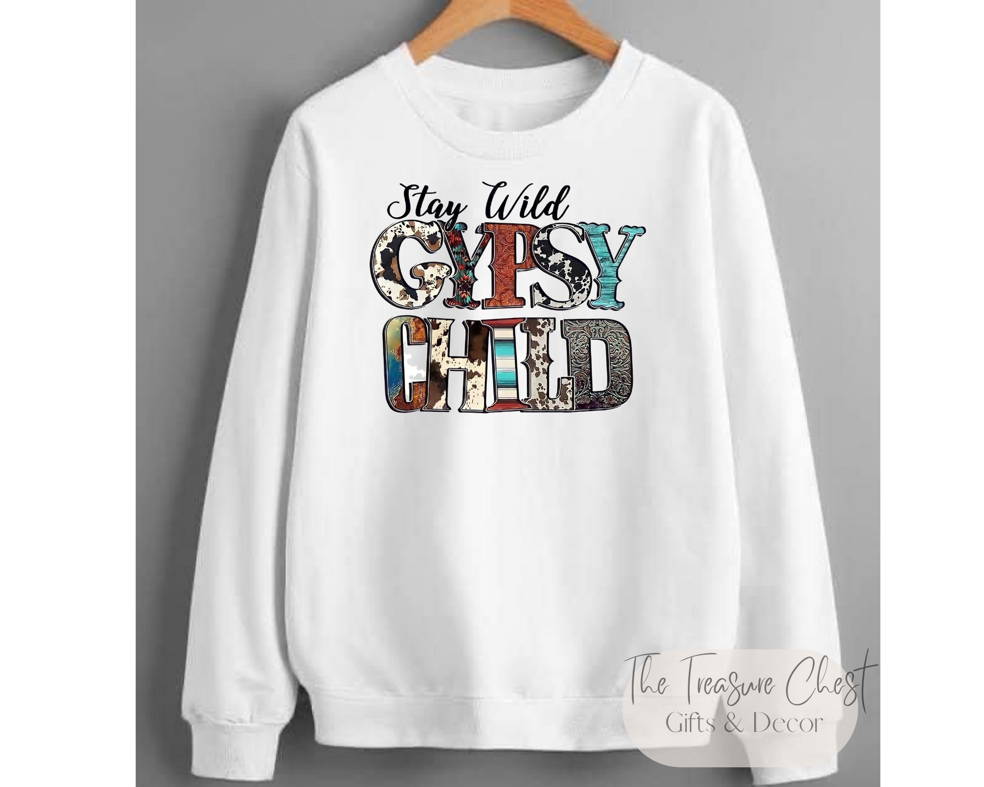 Introducing the Stay Wild Gypsy Child Crewneck Sweatshirt - the perfect way to express your wild side! This cozy and stylish sweatshirt features a classic crewneck cut that's perfect for layering over any outfit. It's made from a high-quality cotton-poly blend for a comfortable fit that's both warm and breathable. White in colour